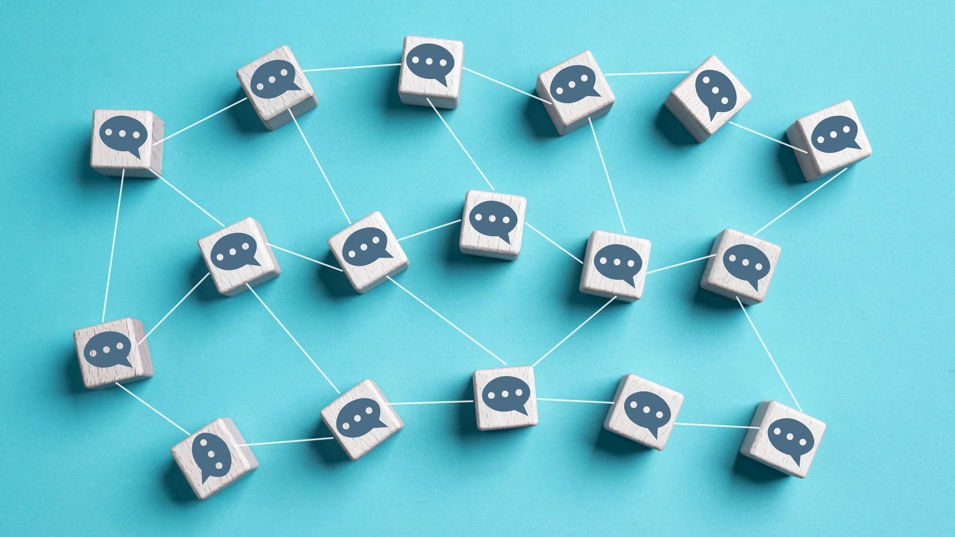 block cubes with dialog boxes on them simulating a multisession chat session