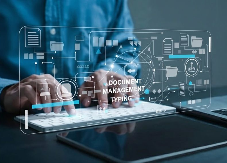 Person typing on a keyboard with translucent document management icons over a desk and tablet