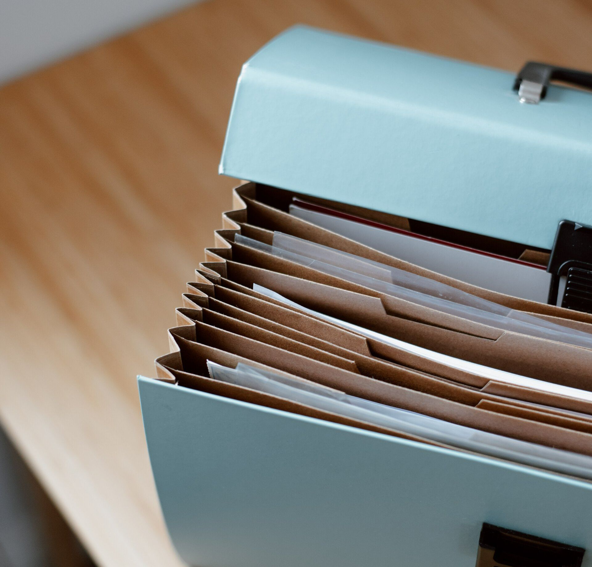 Paper based files in accordian file folders