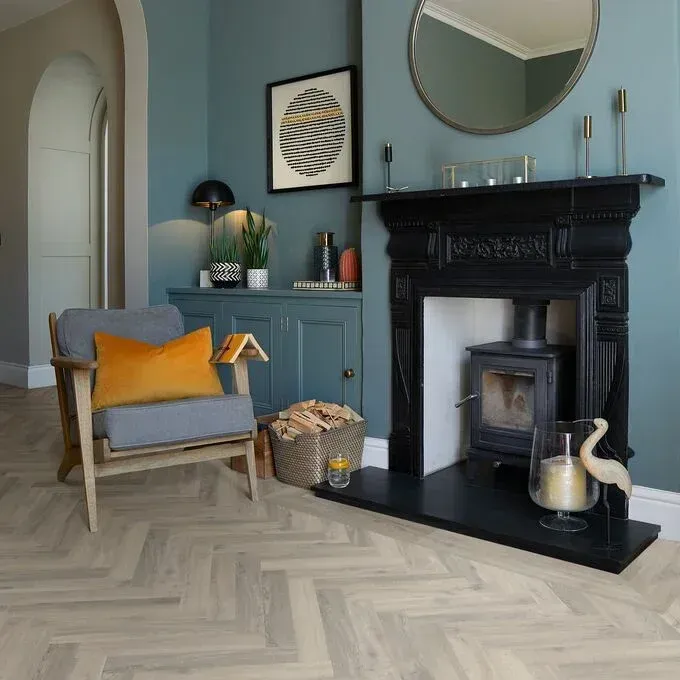 A living room with a fireplace and a chair
