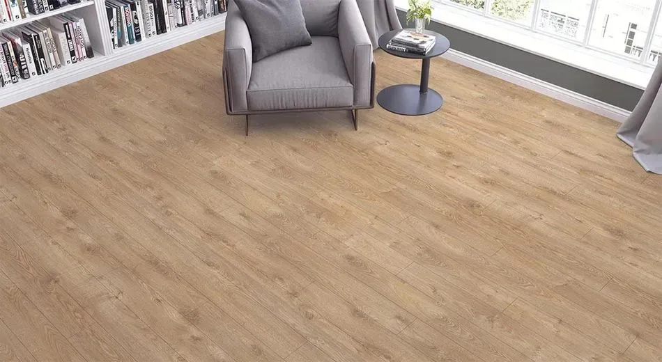 A living room with a chair and a table on a wooden floor.