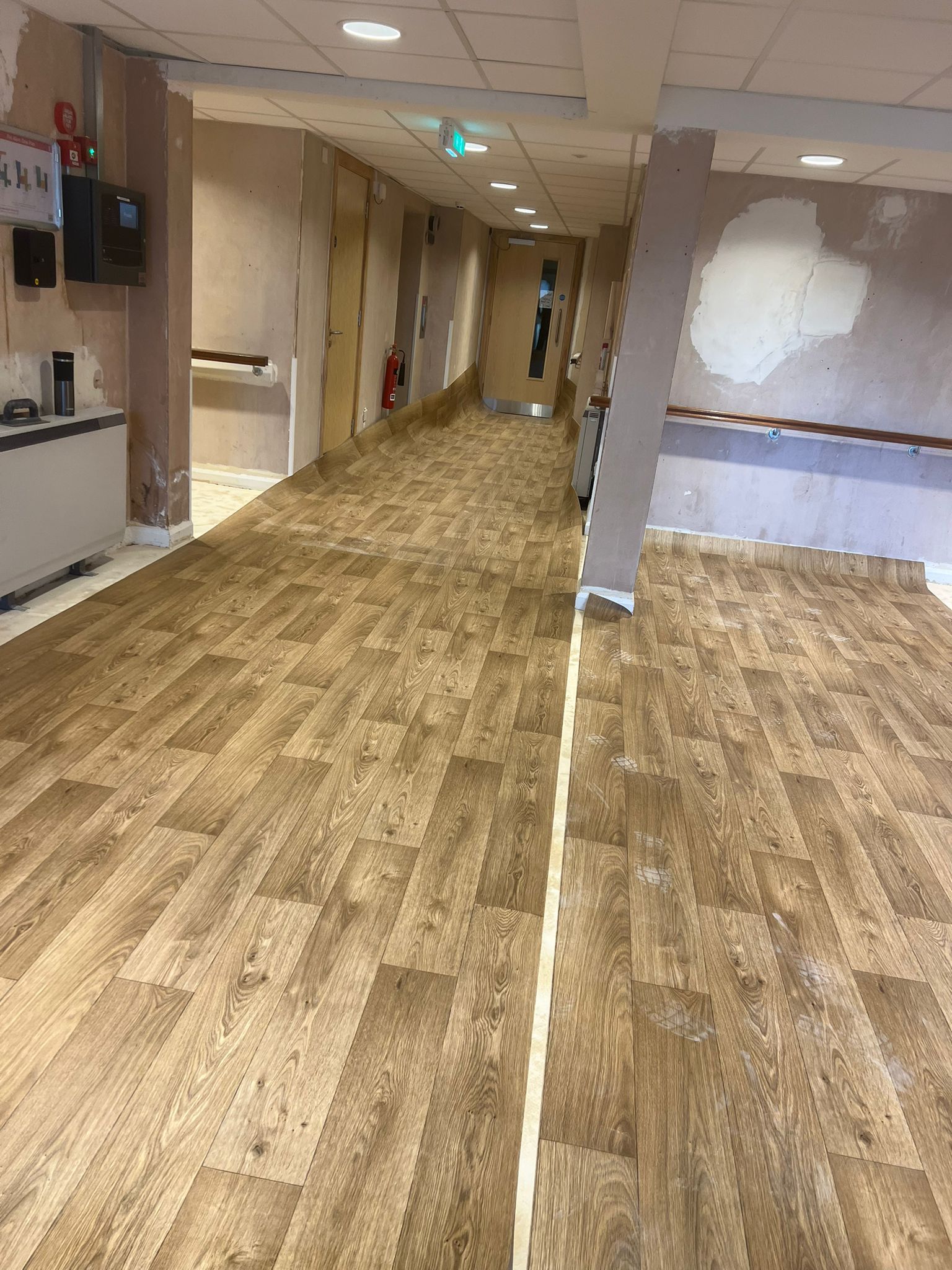 A large office with a lot of desks and chairs