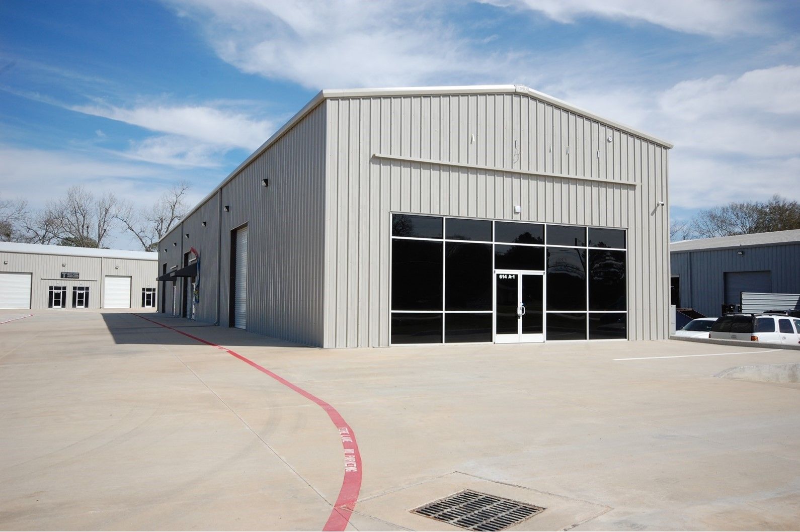 A large metal structure is being built by the black label commercial group