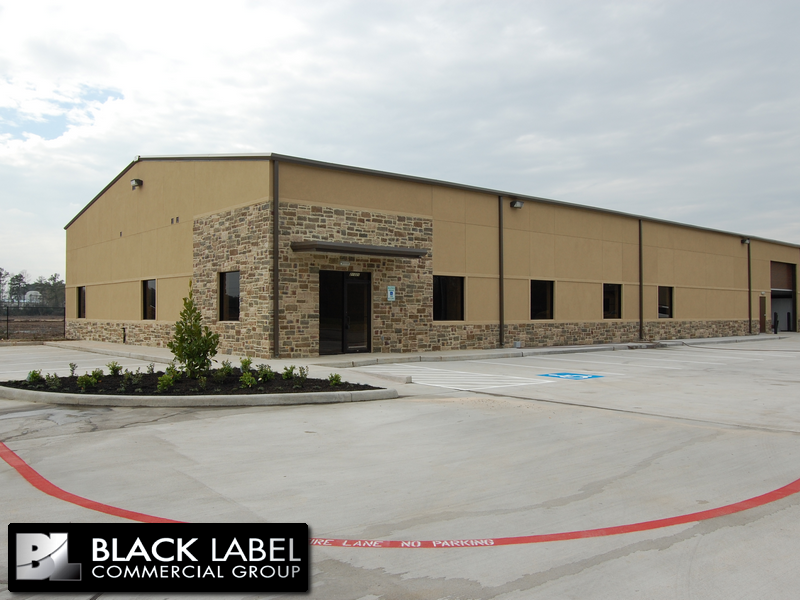 A large building with a sign that says black label commercial group