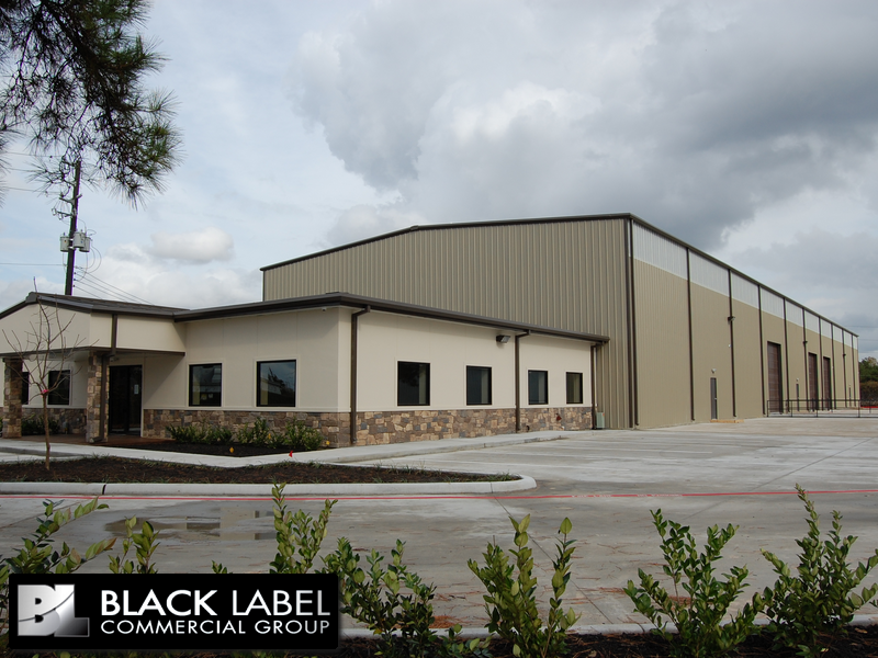 A large building with a sign that says black label commercial group