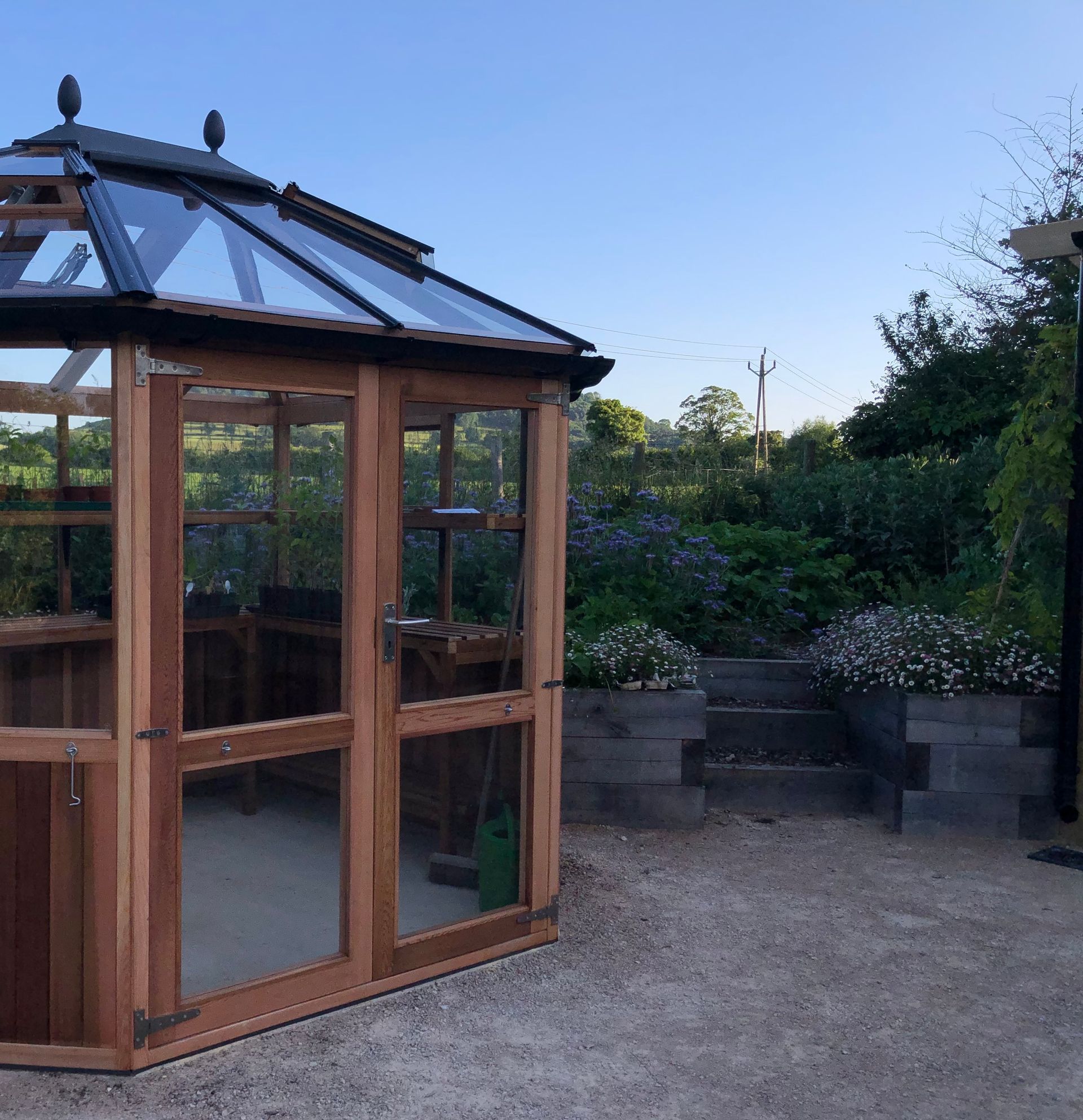 Garden design, wildlife-friendly, organic, cotswold cottage, farmhouse, woodpecker cedar greenhouse, vegetables, oak sleepers
