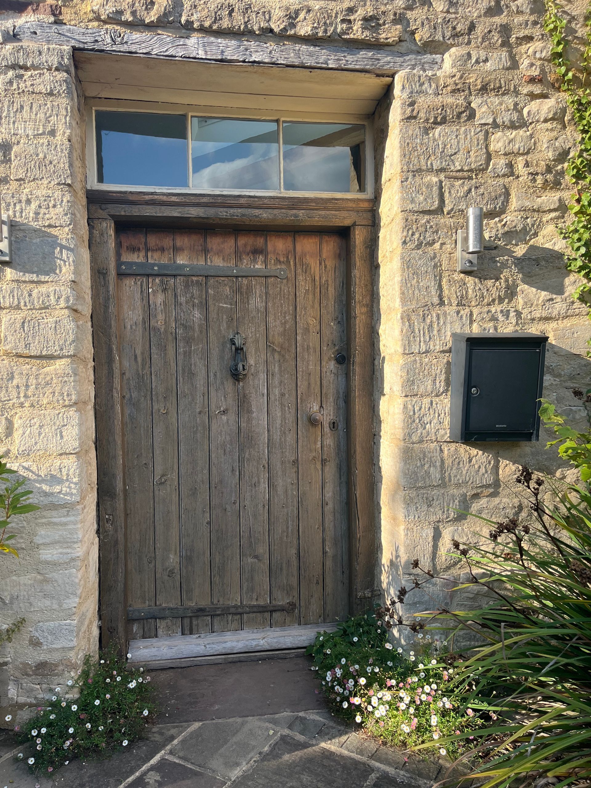garden planting design, cotswold stone cottage farmhouse, front door entrance, soft edges, erigeron, fleabane, rustic, period