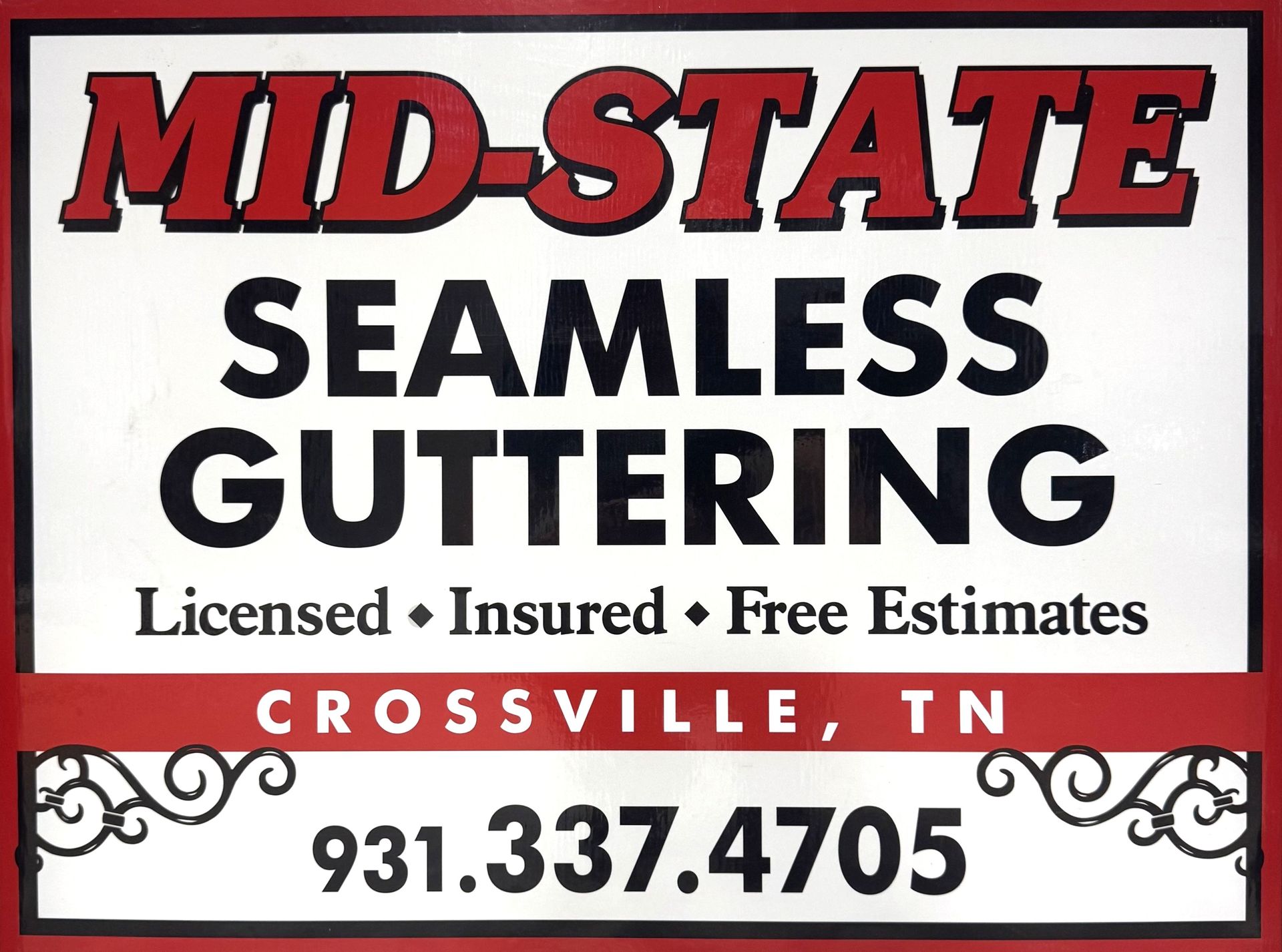 Mid-State Seamless Guttering sign with license, insured, free estimates, Crossville, TN, and phone number