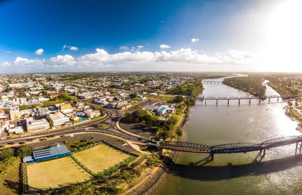 An Aerial View of a Bridge Over a River in a City — Bargara Removals in Bundaberg, QLD