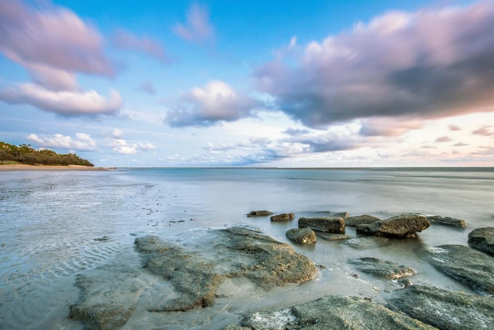Long Exposure of a Beach With Rocks — Bargara Removals in Agnes Waters, QLD