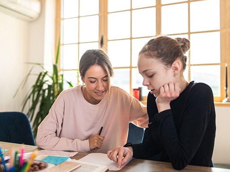 Woman Teaching A Teenager Woman Teaching A Teenager