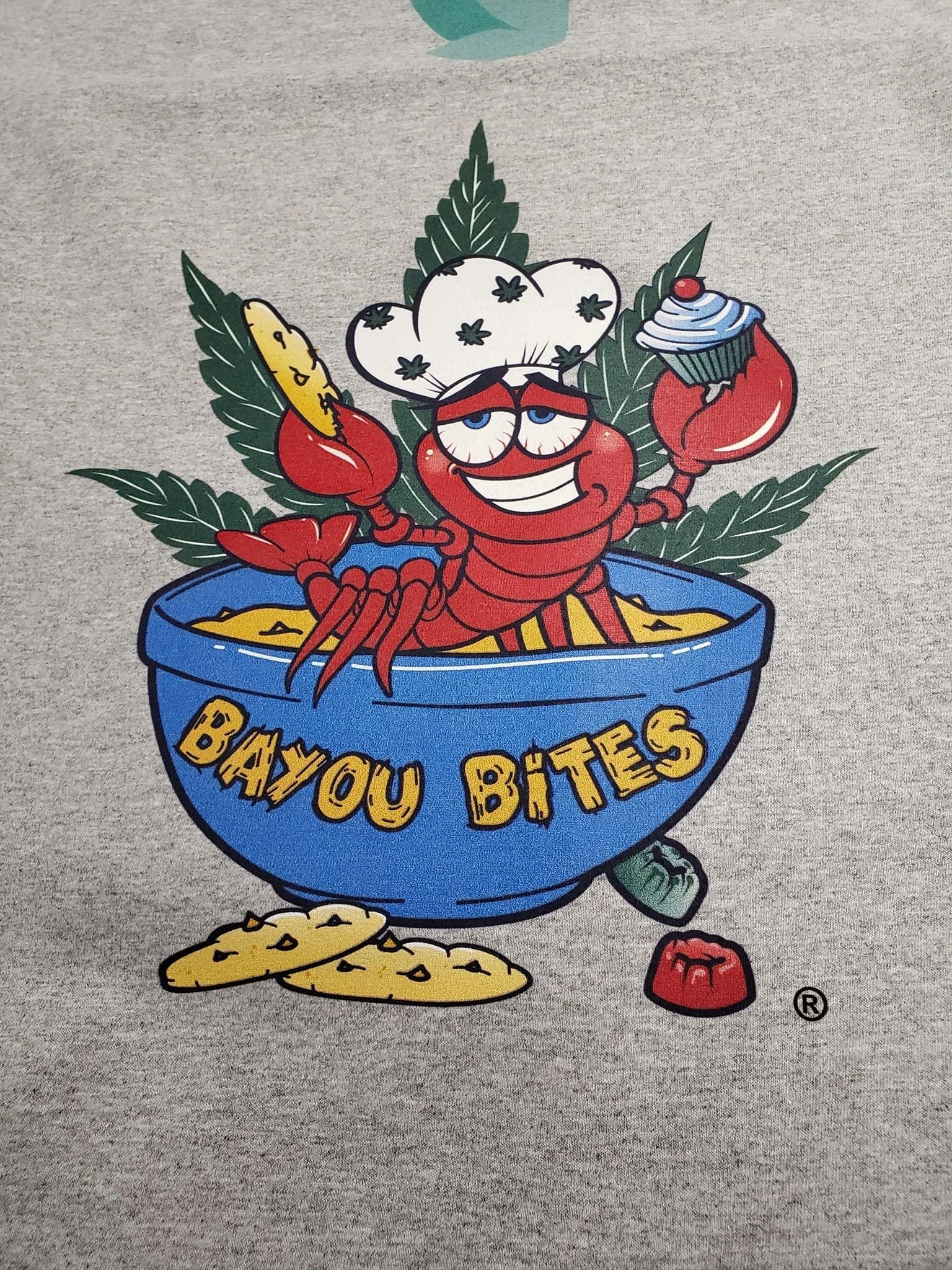 Cartoon crawfish chef in bowl of soup, 