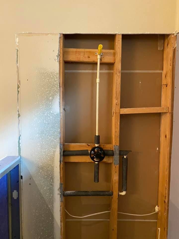 Fast Track Plumbing providing Bathroom Renovation Services Spring TX with an exposed shower valve under renovation.