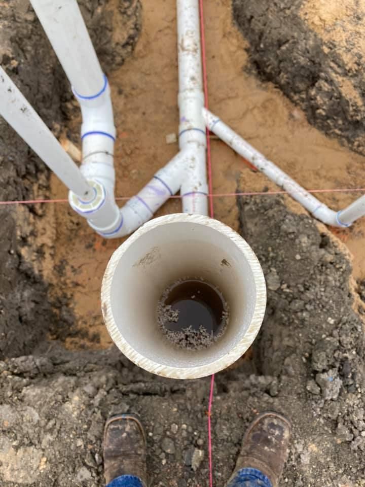 Fast Track Plumbing professionals installing underground piping for Plumbing Installation.