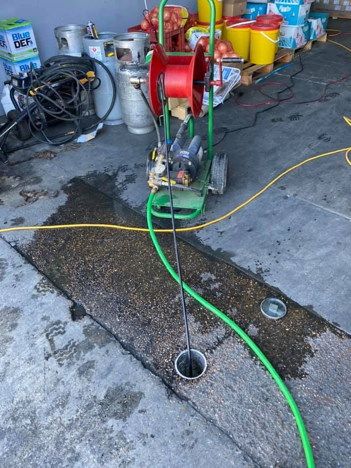 Fast Track Plumbing performing Drain Services Spring TX using professional drain-cleaning equipment.