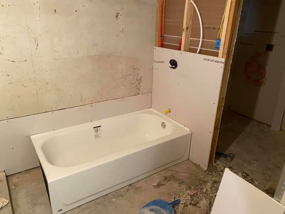 Fast Track Plumbing providing Bathroom Renovation Services Spring TX for an unfinished bathroom with exposed plumbing.