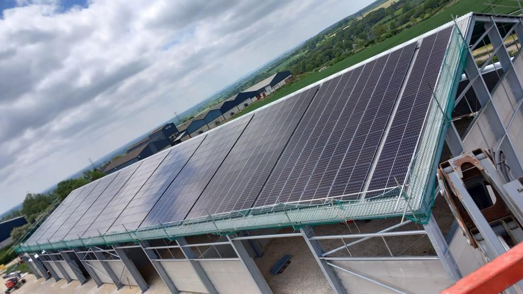 A roof with a lot of solar panels on it