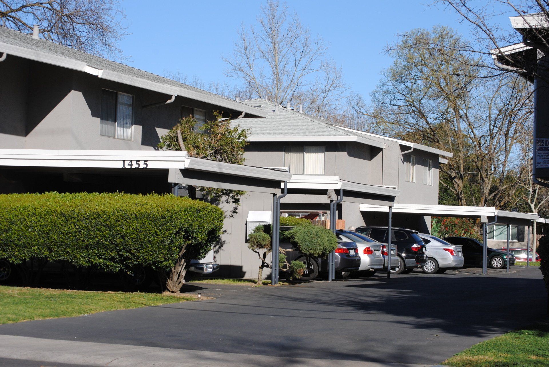 Exterior of Crescent Villa building with carports