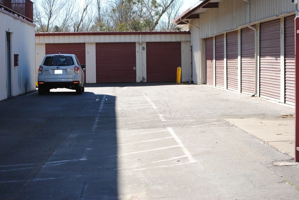 Stonegate Self Storage units and driveway with Uhaul trucks