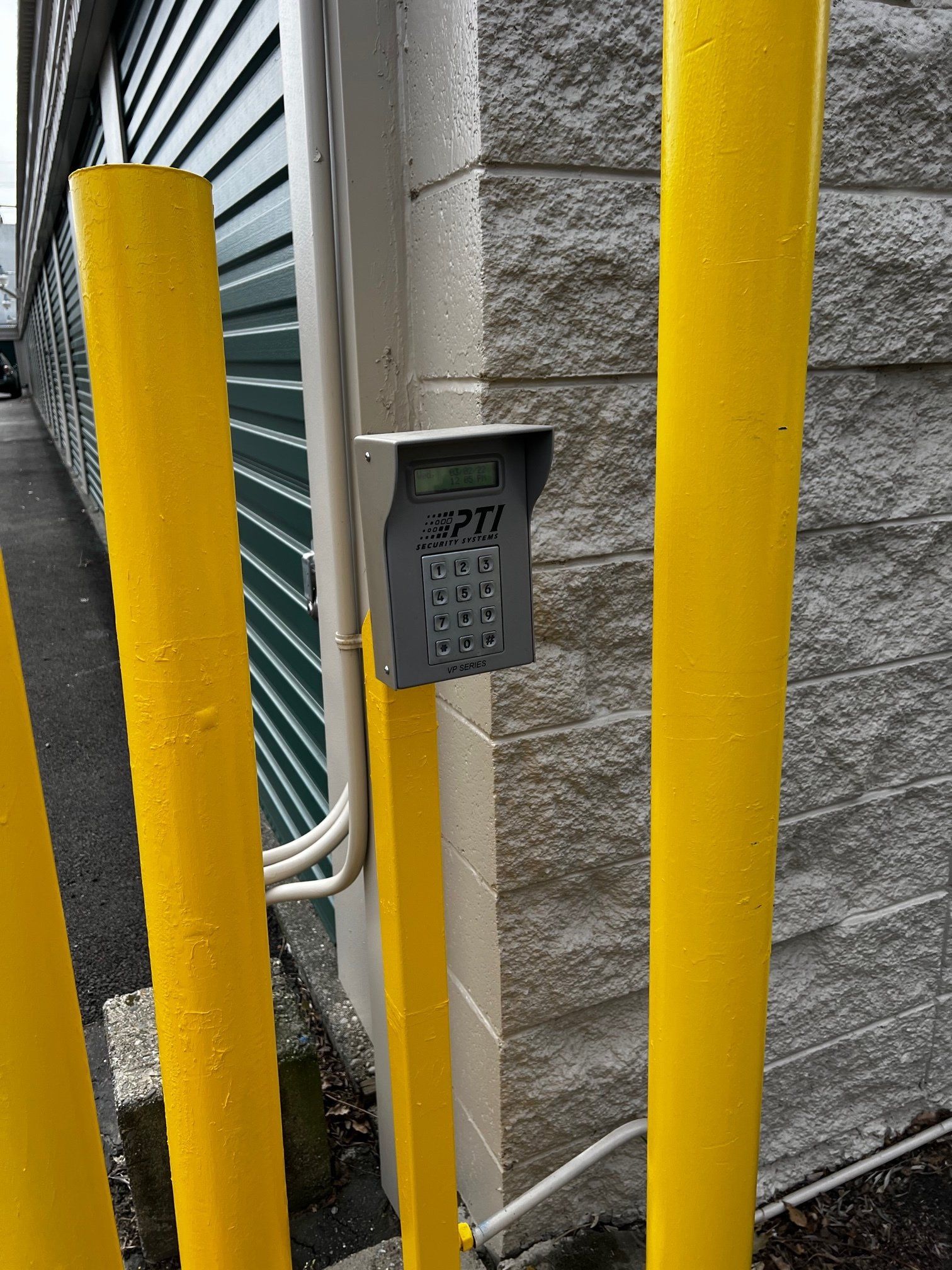 Exterior of Central Davis Storage gate code keypad for entry