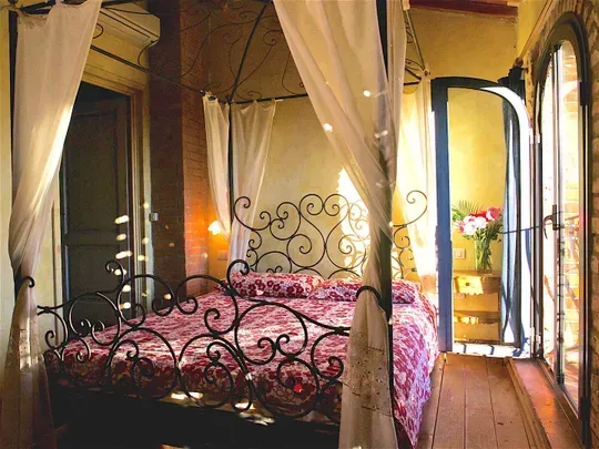 Appartamento di charme Fienile dell’Agriturismo I Pitti con arredi tradizionali toscani