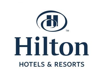 Hilton Hotels & Resorts logo: blue wordmark and emblem on white.