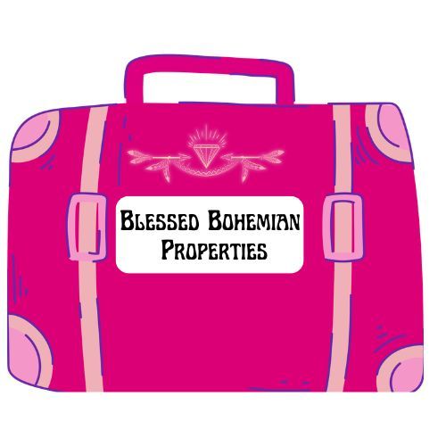 Pink suitcase graphic with “Blessed Bohemian Properties” logo on front