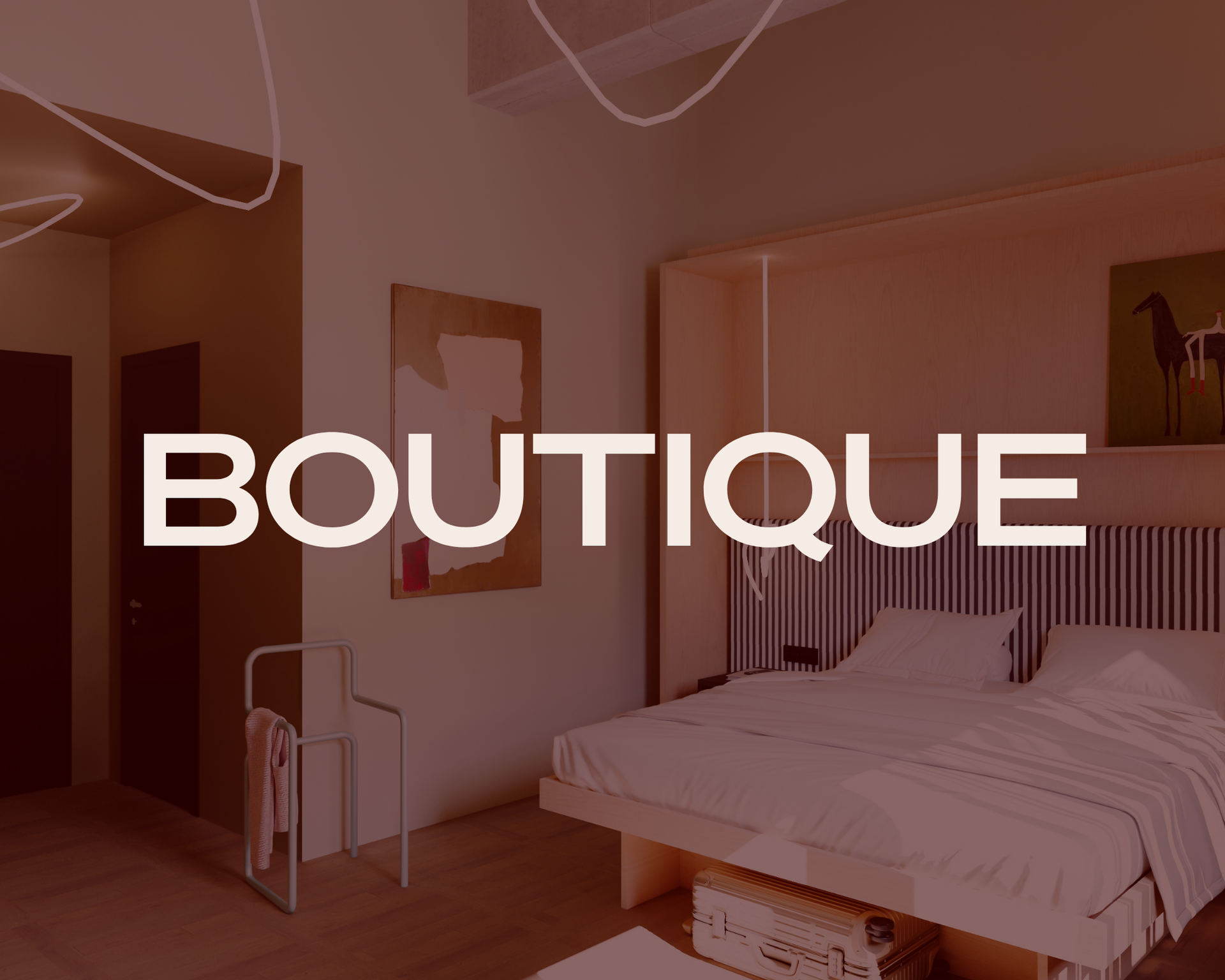Boutique bedroom interior with white bed, warm lighting, and minimalist decor