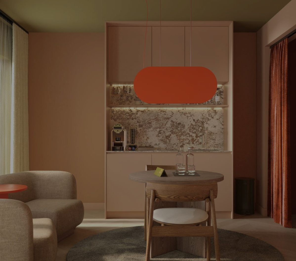 Modern living room with a small round table, beige chair, and built-in cabinet lit by warm light