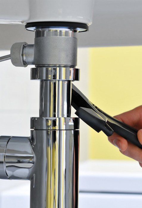 Plumber Fixing Metal Pipe — San Jose, CA — Alert Plumbing, Inc.