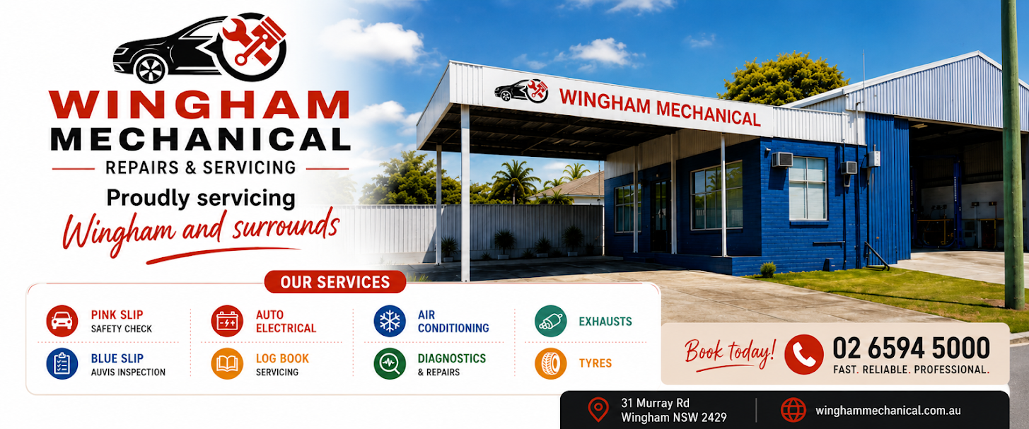 Mechanic Inspecting a Car with Open Hood in A Bright Auto Repair Shop — Wingham Mechanical in Wingham, NSW
