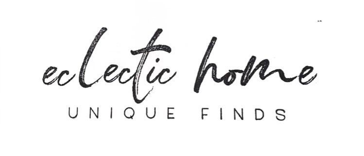 A black and white logo for eclectic home unique finds.