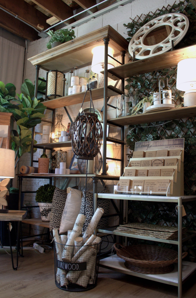 A room filled with lots of shelves and lamps.