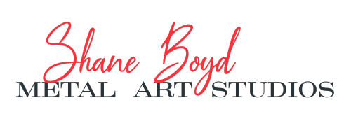 Shane Boyd Metal Art Studios logo in red script over black text.