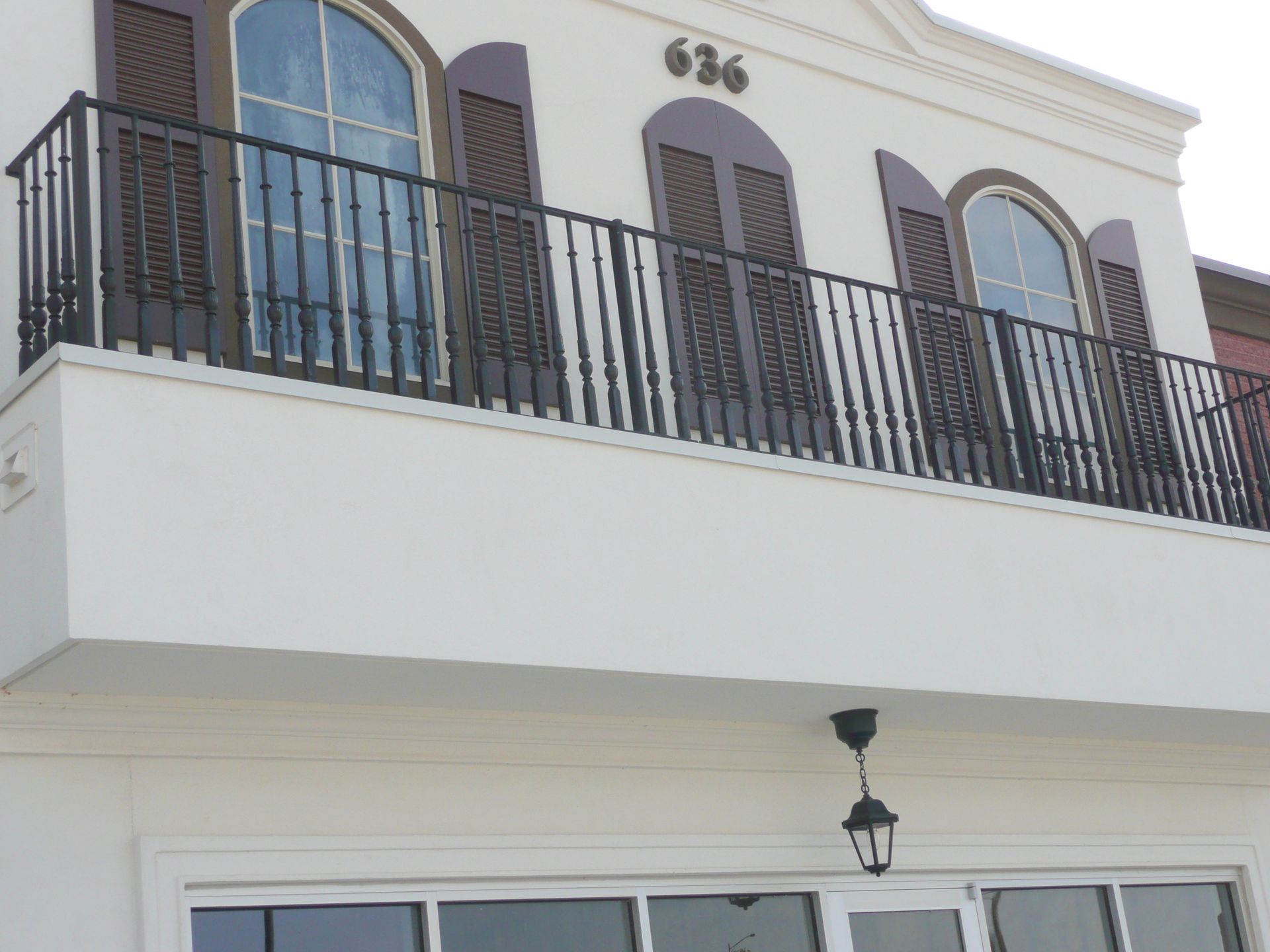 A white building with the number 636 on the top