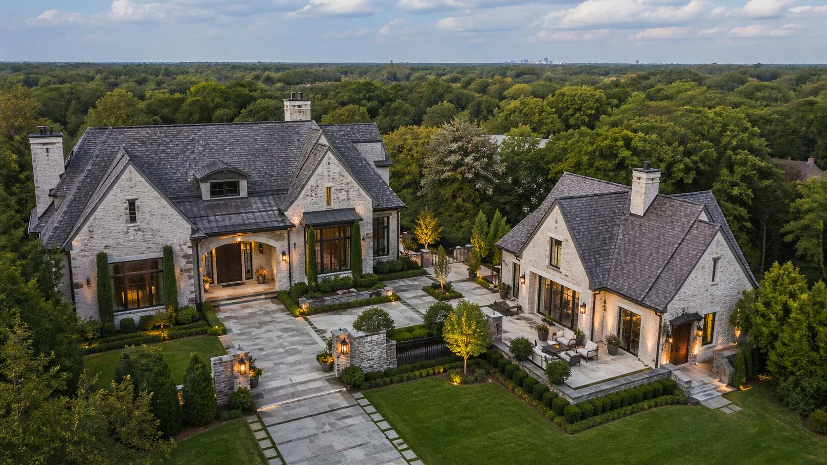 Aerial view of Charlotte luxury home with separate ADU guest cottage on half-acre lot