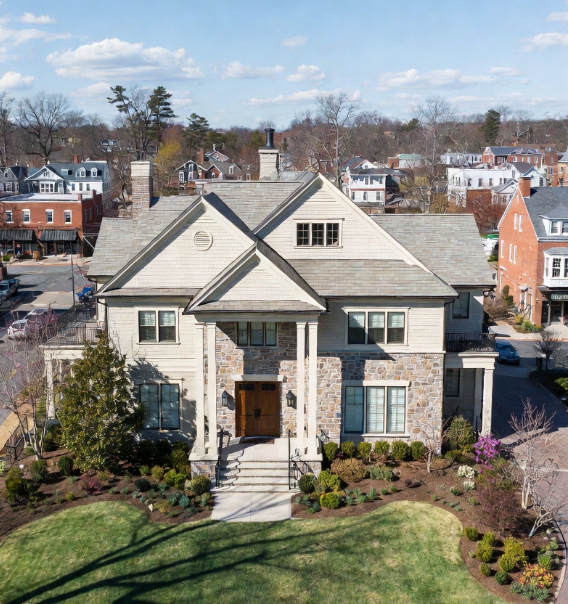 White coastal-style luxury homes in a residential neighborhood near Lake Norman, NC.