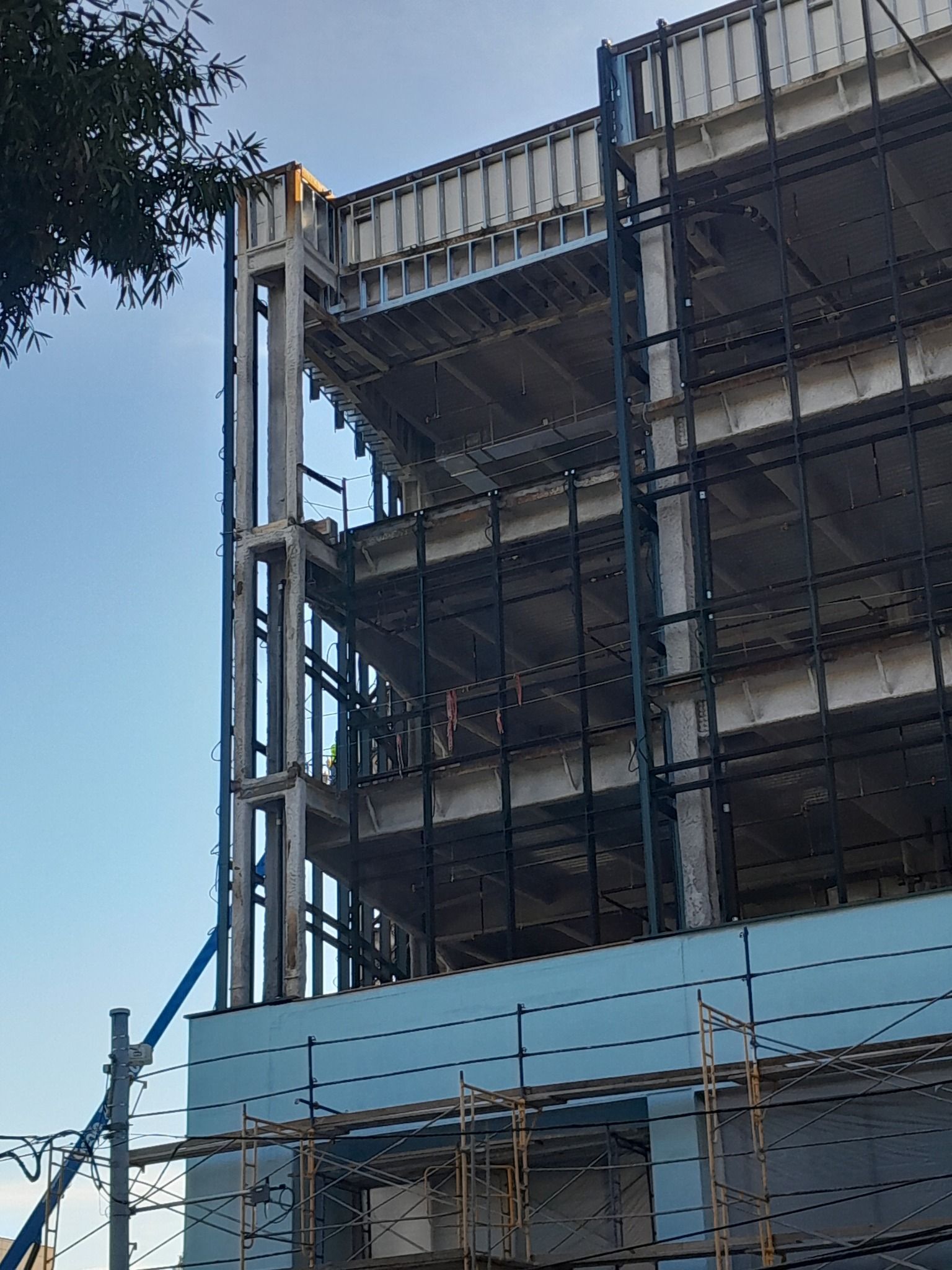 A large building under construction with scaffolding around it