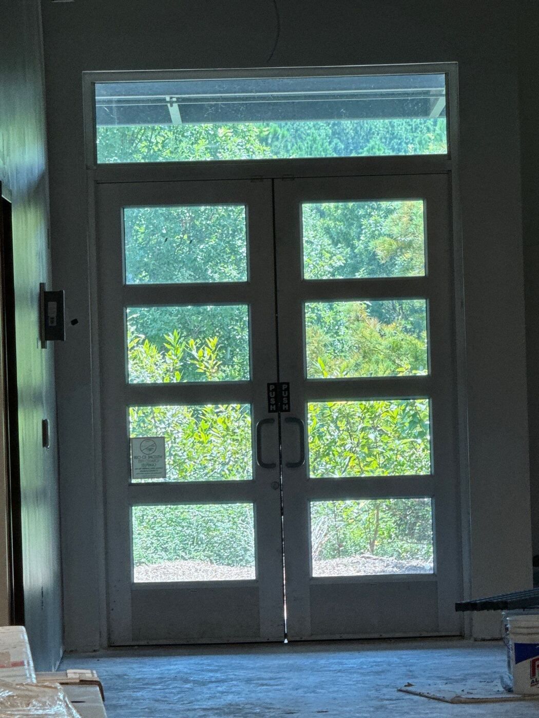 Glass entrance doors and storefront framing at Lanier Technical College in Griffin, GA.