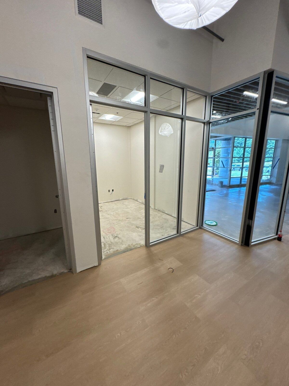 Interior glass office partition with aluminum framing at Lanier Technical College in Griffin, GA.