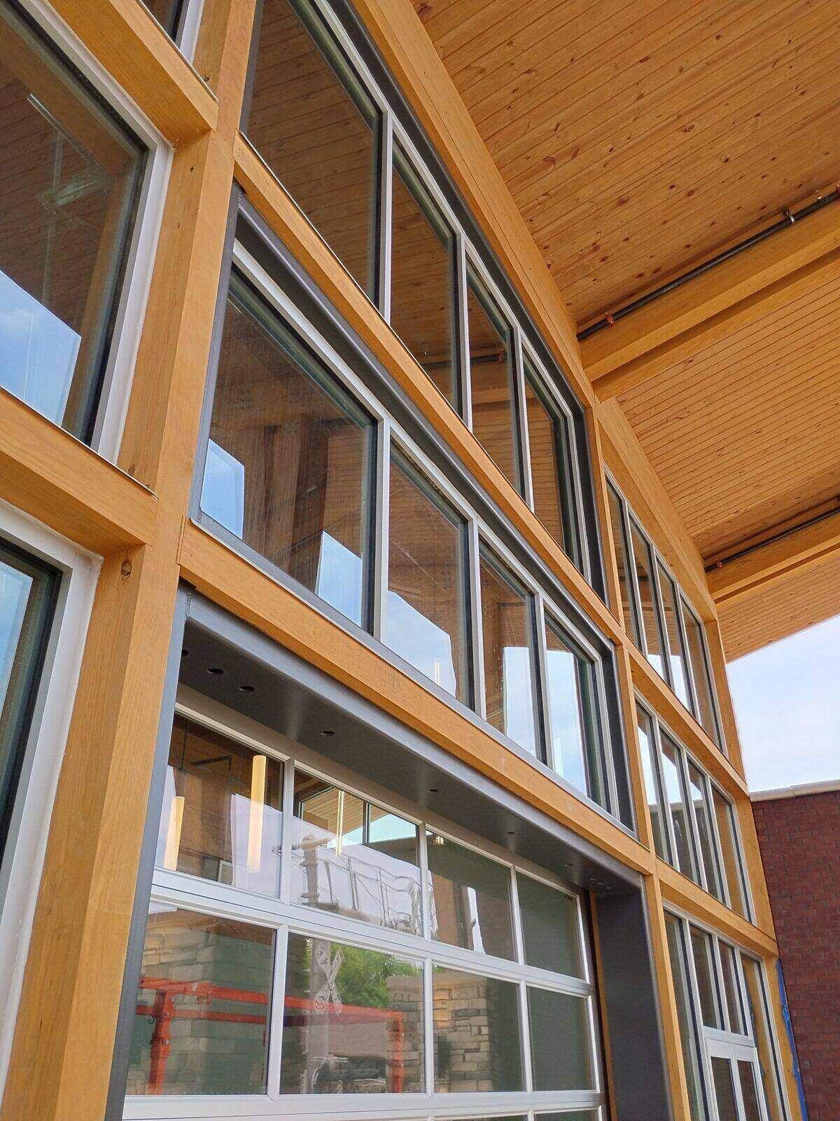Aluminum-framed commercial glass and wood detailing installed by AGS at Lankford Corner in Griffin, GA