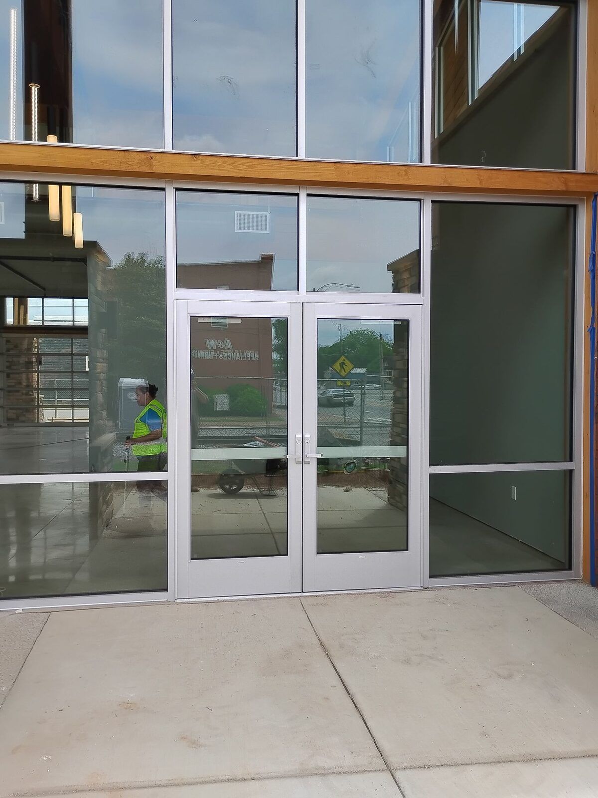 Commercial glass storefront entrance doors with aluminum framing at Lankford Corner in Griffin, GA.