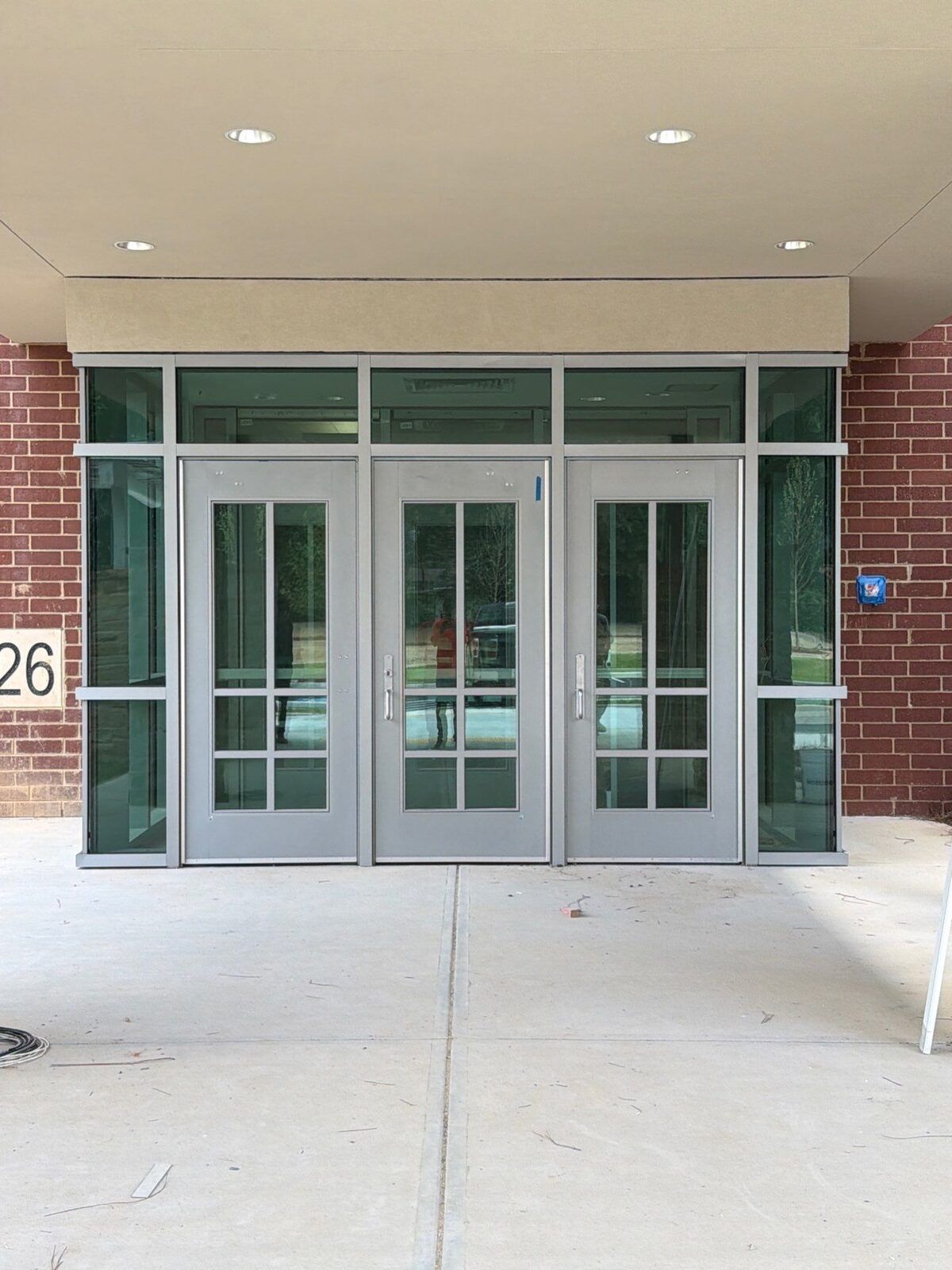 Commercial glass entrance doors and vestibule with aluminum framing at S.L. Lewis Elementary School in Griffin, GA.