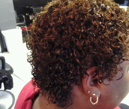 Photo of a woman with chemical services done in her hair