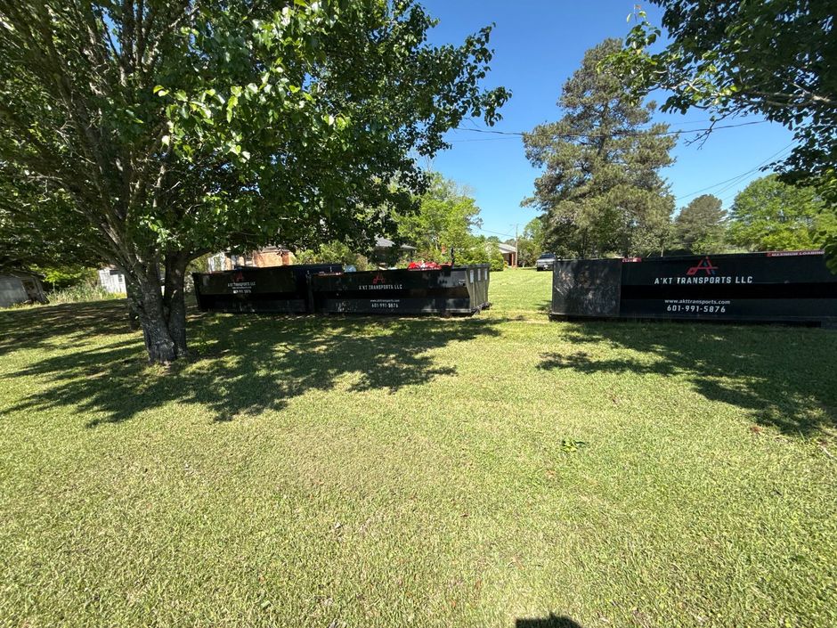 Roll-off dumpster at a job site