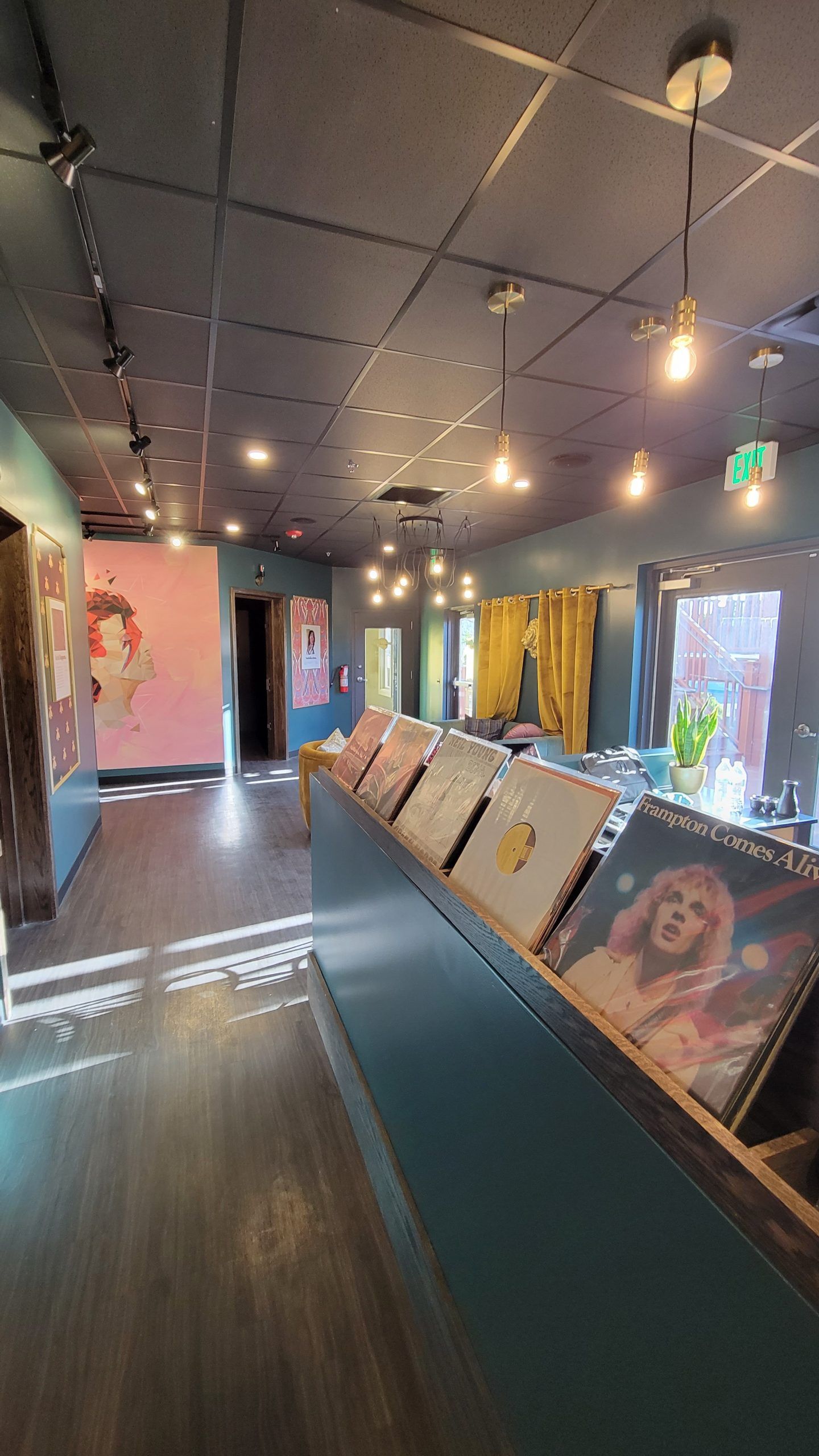 A large room with a lot of records on display.