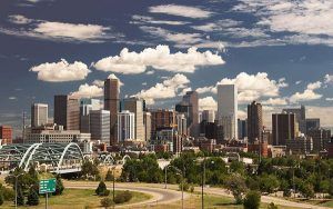 A city skyline with a bridge in the foreground