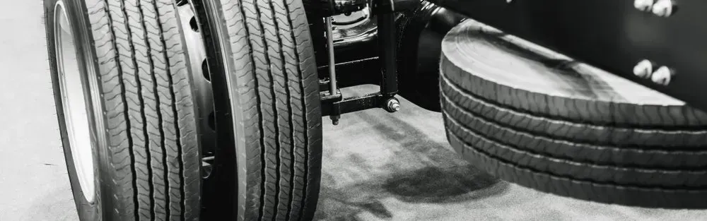 A Close-up of a Truck's Dual Rear Wheels and a Spare Tire — Mid North Coast Heavy Vehicle Repairs In Wauchope, NSW