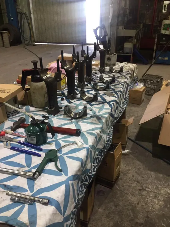 Engine Connecting Rods and Bearing Caps Arranged on a Table — Mid North Coast Heavy Vehicle Repairs In Wauchope, NSW