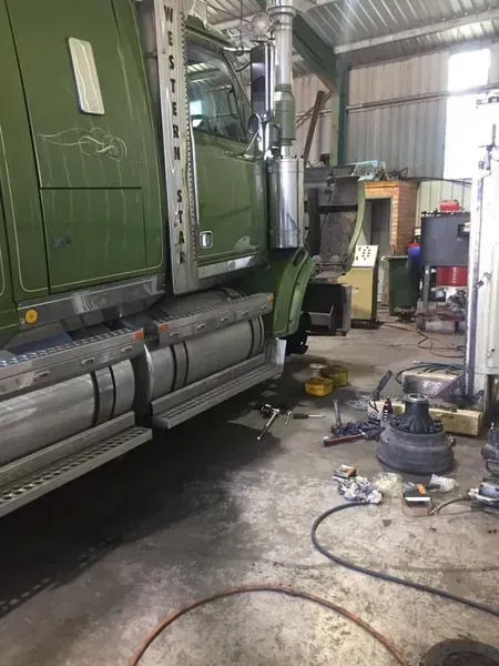 A Green Western Star Semi-truck in a Garage — Mid North Coast Heavy Vehicle Repairs In Wauchope, NSW